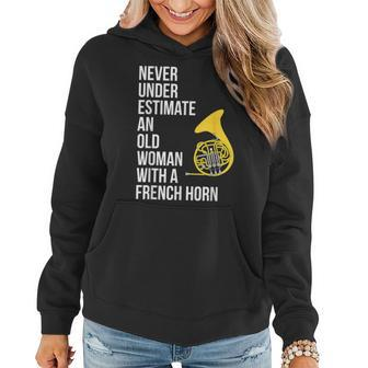 Never Underestimate An Old Woman With A French Horn Women Hoodie - Seseable
