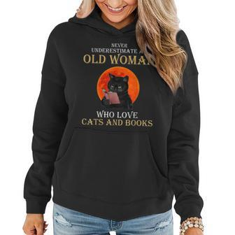 Never Underestimate An Old Woman Who Love Cats And Books Women Hoodie - Seseable
