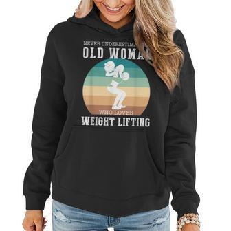 Never Underestimate An Old Woman Who Loves Lifting Women Hoodie - Thegiftio UK