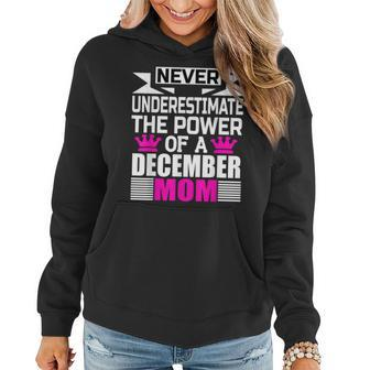 Never Underestimate The Power Of A December Mom Women Hoodie - Seseable