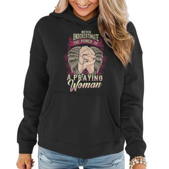 Never Underestimate The Power Of A Praying Woman Women Hoodie - Seseable