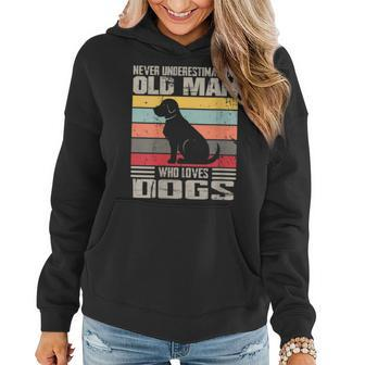 Vintage Never Underestimate An Old Man Who Loves Dogs Cute Women Hoodie - Seseable