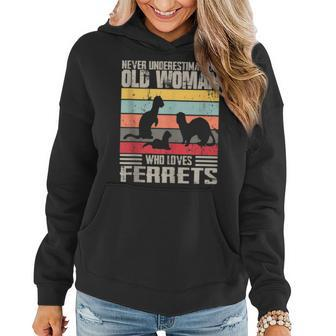 Vintage Never Underestimate An Old Woman Who Loves Ferrets Women Hoodie | Mazezy