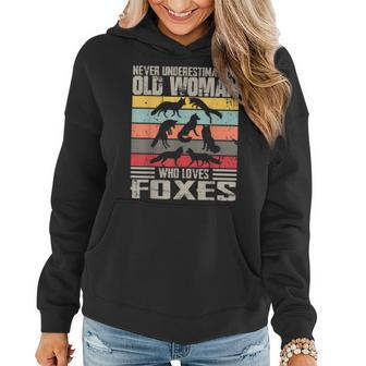 Vintage Never Underestimate An Old Woman Who Loves Foxes Women Hoodie | Mazezy