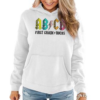 Abcd First Grade Rocks Back To School 1St Grade Teacher Women Hoodie - Monsterry