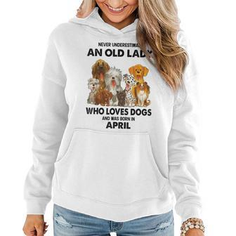 April Never Underestimate An Old Lady Who Loves Dogs Women Hoodie - Seseable