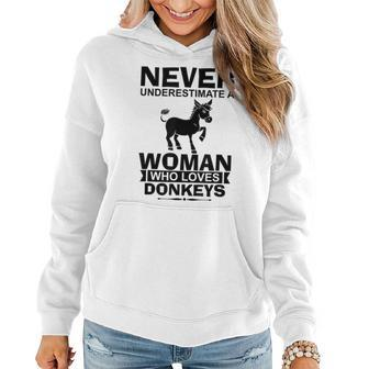 Donkey Lover Funny Gift Never Underestimate A Woman Who Women Hoodie - Seseable