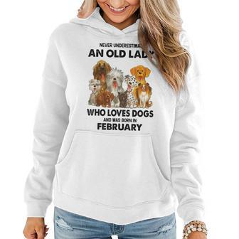 February Never Underestimate An Old Lady Who Loves Dogs Women Hoodie - Seseable