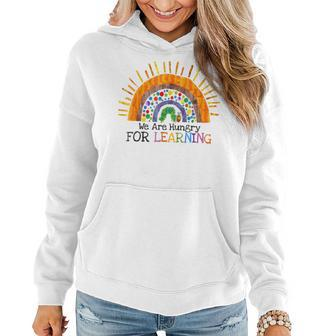 We Are Hungry For Learning Rainbow Caterpillar Teacher Women Hoodie - Monsterry