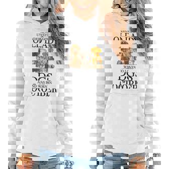 Never Underestimate An Old Lady Who Loves Dogs Born October Women Hoodie | Mazezy