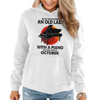 Never Underestimate An Old Lady With A Piano Born In October Women Hoodie - Seseable
