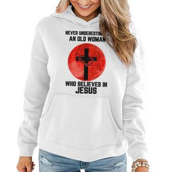 Never Underestimate An Old Woman Who Believes In Jesus Old Woman Funny Gifts Women Hoodie | Mazezy