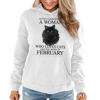 Never Underestimate A Woman Who Loves Cats Born In February Women Hoodie | Mazezy