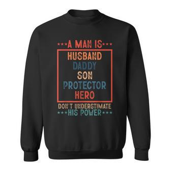A Man Is Husband Daddy Son Protector Hero Fathers Day Sweatshirt | Mazezy