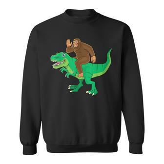 Bigfoot Riding Dinosaur T Rex Funny Men Boys Sasquatch Lover Sweatshirt - Seseable