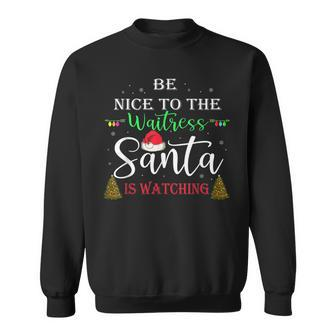 Christmas Be Nice To The Waitress Santa Is Watching Sweatshirt - Monsterry DE