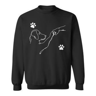 Dog And People Punch Hand Dog Friendship Fist Bump Dog's Paw Sweatshirt - Monsterry