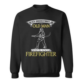 Firefighter Never Underestimate An Old Man Gift Old Man Funny Gifts Sweatshirt | Mazezy