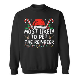 Christmas Most Likely To Pet The Reindeer Sweatshirt | Mazezy