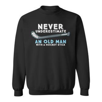 Hockey Grandpa Never Underestimate An Old Man With A Stick Grandpa Funny Gifts Sweatshirt | Mazezy