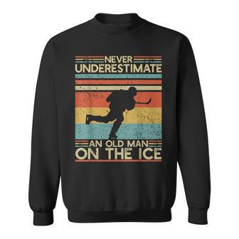 Hockey Lovers Never Underestimate An Old Man On The Ice Old Man Funny Gifts Sweatshirt | Mazezy