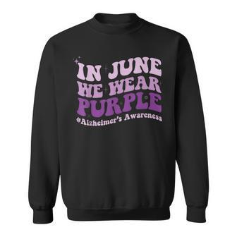 In June We Wear Purple Alzheimer Awareness Month Groovy Sweatshirt | Mazezy