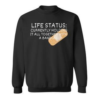 Life Status Currently Holding It All Together Band-Aid Sweatshirt | Mazezy