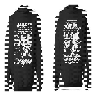 Most Likely Never Underestimate An Old Guy On A Bicycle Sweatshirt | Mazezy