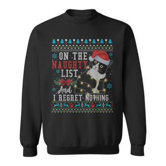 On The Naughty List And I Regret Nothing Cat Christmas Sweatshirt - Seseable