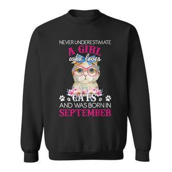 Never Underestimate A Girl Who Love Cat Born In September Sweatshirt - Seseable