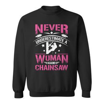 Never Underestimate A Woman With A Chainsaw Sweatshirt - Seseable