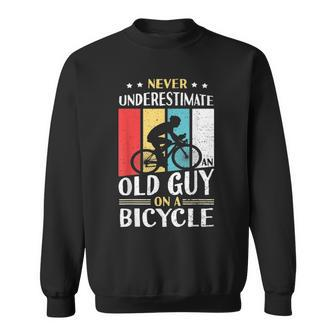 Never Underestimate An Old Guy On A Bicycle Bike Cyclist Sweatshirt - Seseable
