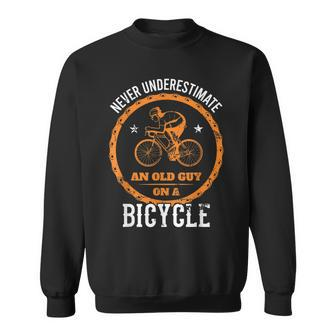 Never Underestimate An Old Guy On A Bicycle Cycling Biking Sweatshirt - Seseable