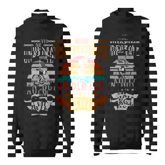 Never Underestimate An Old Guy On A Bicycle Cycling Cycling Funny Gifts Sweatshirt | Mazezy