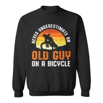 Never Underestimate An Old Guy On A Bicycle Funny Riders Dad Sweatshirt - Seseable