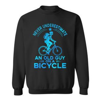 Never Underestimate An Old Guy On A Bicycle Nice Cycling Sweatshirt - Seseable