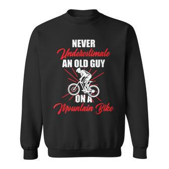 Never Underestimate An Old Guy On A Mountain Bike Cycling Sweatshirt - Seseable
