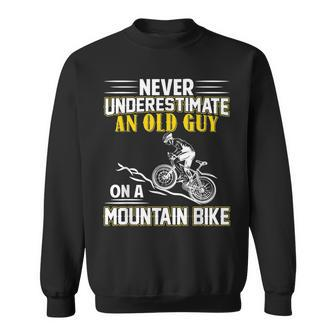 Never Underestimate An Old Guy On A Mountain Bike Gift For Mens Sweatshirt - Seseable