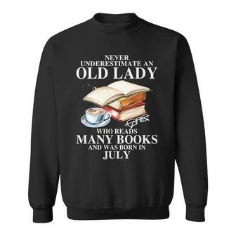 Never Underestimate An Old July Lady Who Reads Many Books Sweatshirt - Seseable