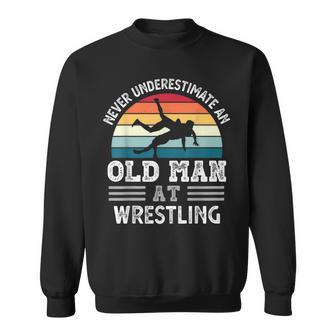 Never Underestimate An Old Man At Wrestling Fathers Day Gift For Mens Sweatshirt - Seseable