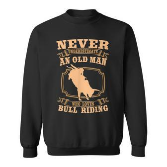 Never Underestimate An Old Man Bull Riding Rodeo Sport Old Man Funny Gifts Sweatshirt | Mazezy