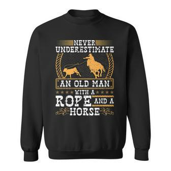 Never Underestimate An Old Man Cowboy Rodeo Calf Roping Old Man Funny Gifts Sweatshirt | Mazezy