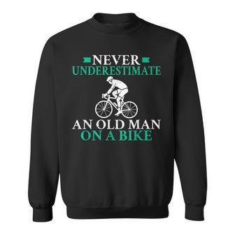 Never Underestimate An Old Man On A Bike Biking Bike Bicycle Old Man Funny Gifts Sweatshirt | Mazezy