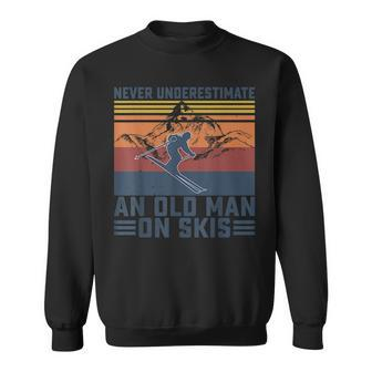 Never Underestimate An Old Man On Skis Funny Skiing Lover Old Man Funny Gifts Sweatshirt | Mazezy