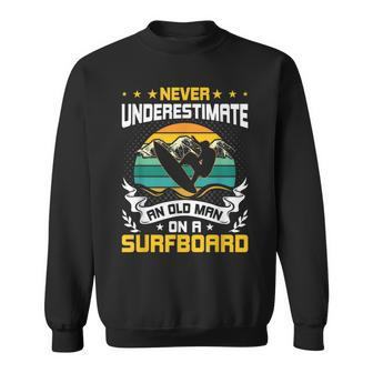 Never Underestimate An Old Man On Surfboard Surfing Sweatshirt - Seseable