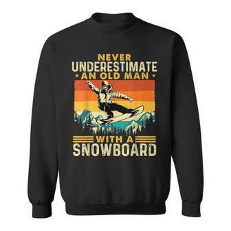 Never Underestimate An Old Man Snowboarding Snowboarder Old Man Funny Gifts Sweatshirt | Mazezy