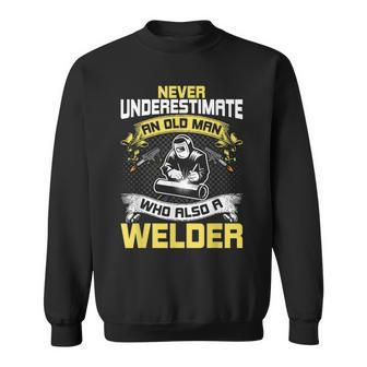 Never Underestimate An Old Man Who Also A Welder Sweatshirt - Seseable