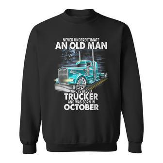 Never Underestimate An Old Man Who Is A Trucker Born October Sweatshirt - Seseable