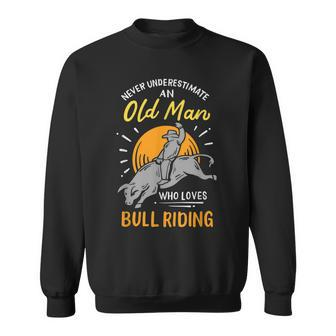 Never Underestimate An Old Man Who Loves Bull Riding Gift For Mens Sweatshirt - Seseable