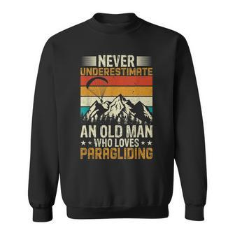 Never Underestimate An Old Man Who Loves Paragliding Gift For Mens Sweatshirt | Mazezy